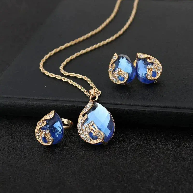 Blaues Kristall-Halsketten- und Ohrring-Set in Blauem Kristall in Gold