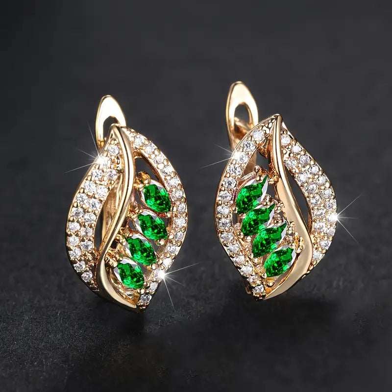 Elegante naturinspirierte Gold Ohrringe