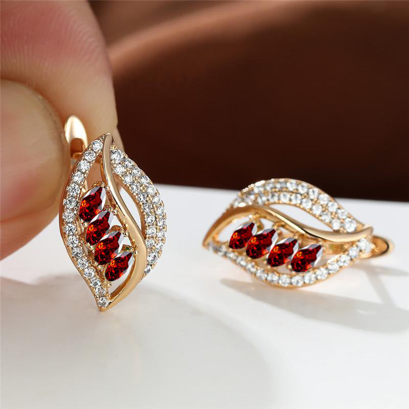 Elegante Ruby Gold Tropfenohrringe