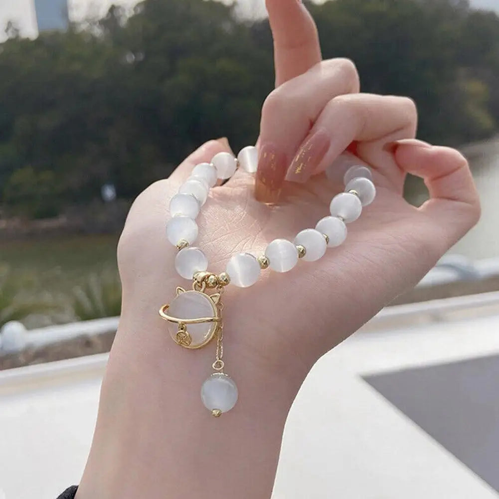 Perlenarmband mit Glückskatze-Anhänger
