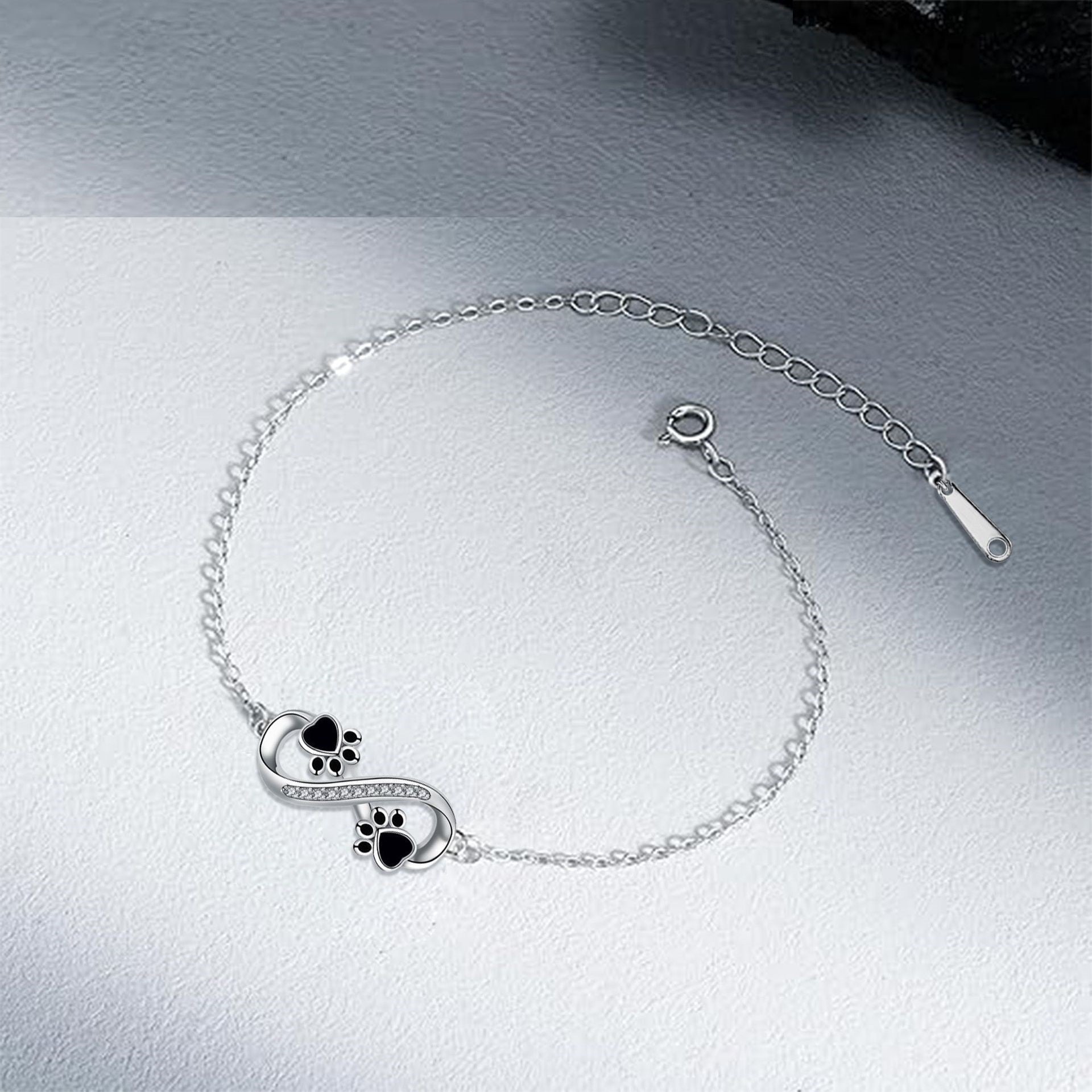 Unendliches Symbol Anhänger Haustierpfote Armband mit Zirkonia