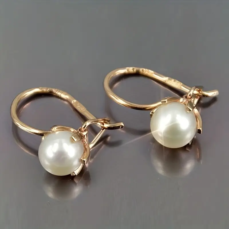 Elegante Gold-Perlenohrringe