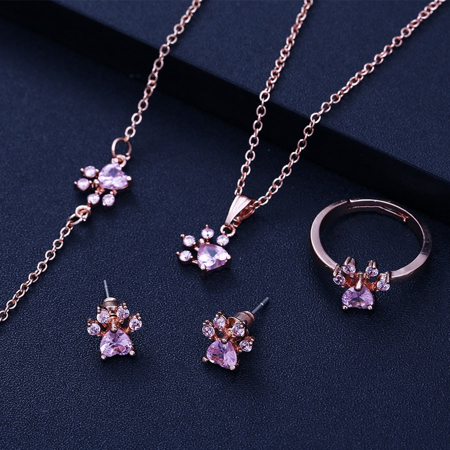 Roségoldenes Pfoten-Schmuckset – 4 Teile mit Zirkonia-Herz (Ring, Halskette, Ohrringe, Armband)