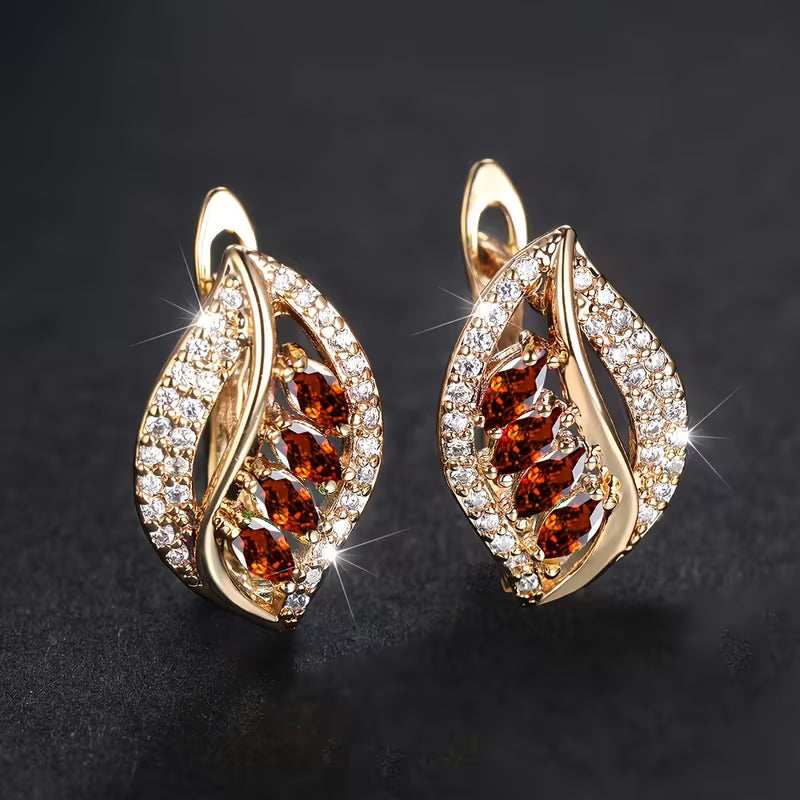 Elegante naturinspirierte Gold Ohrringe