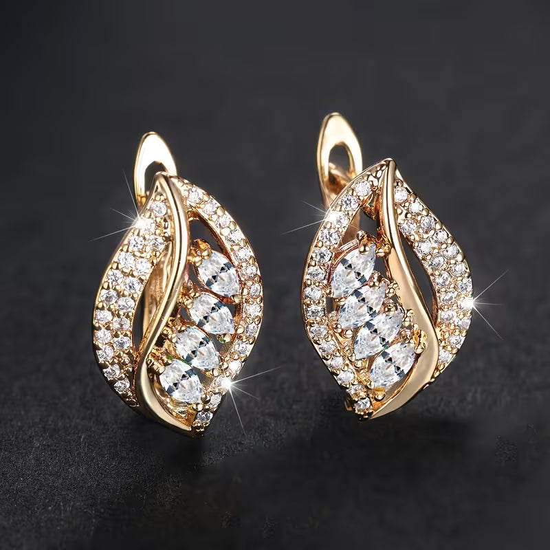 Elegante naturinspirierte Gold Ohrringe