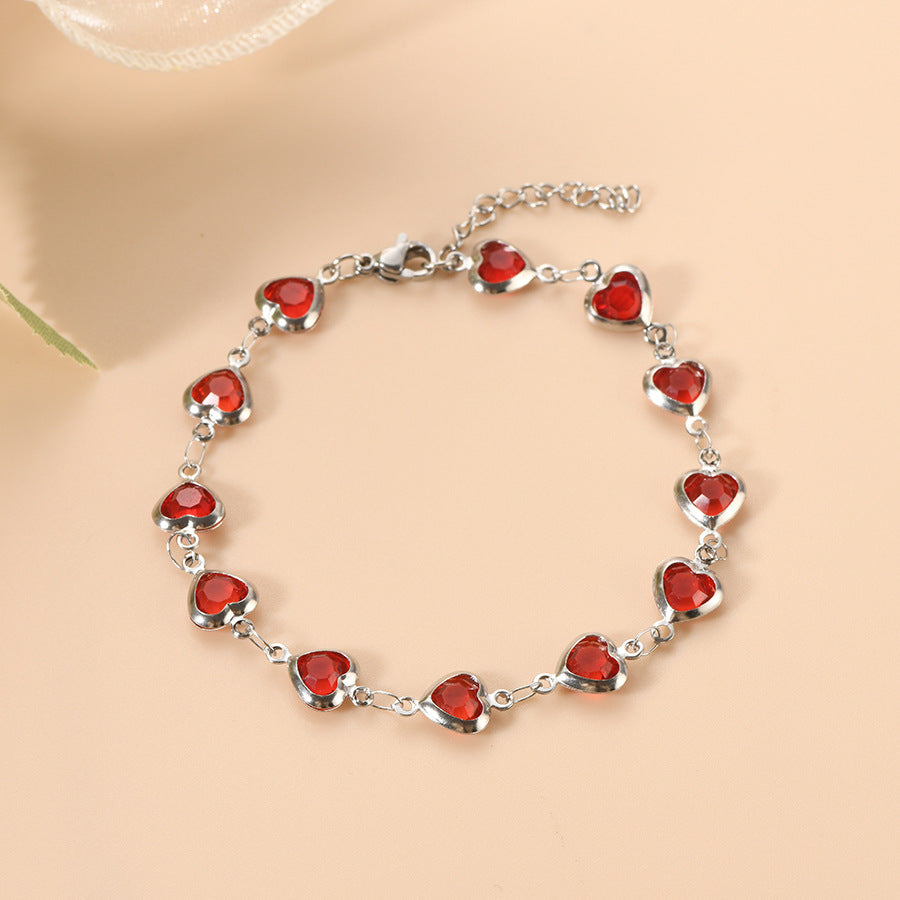 Anspruchsvolles Granat-Armband aus Weißgold