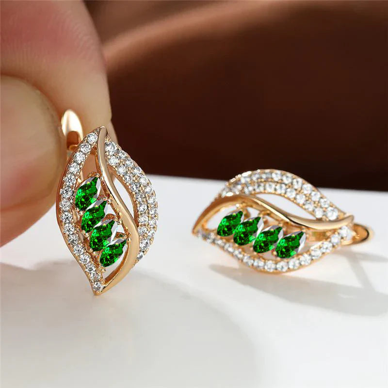 Elegante naturinspirierte Gold Ohrringe