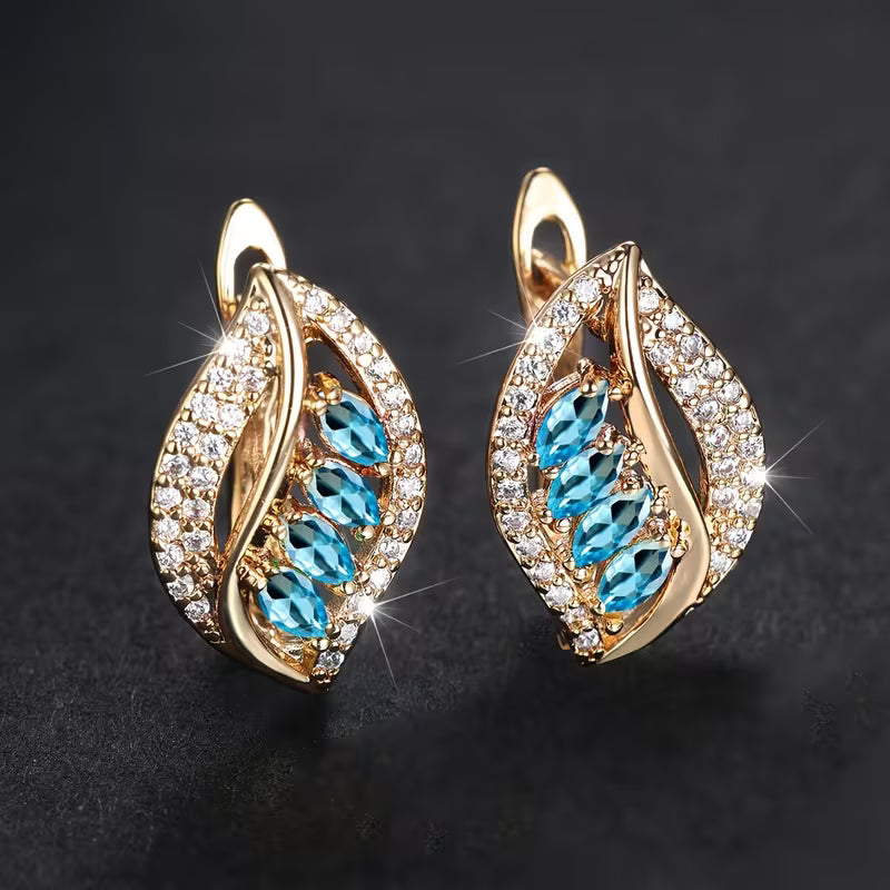 Elegante naturinspirierte Gold Ohrringe