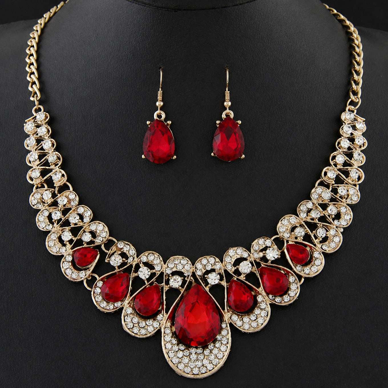 Elegantes karmesinrotes Gold Schmuckset